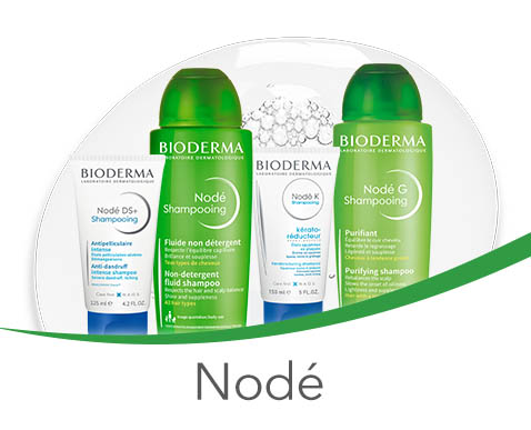 Sampoanele Bioderma Nodé pentru diferite tipuri de par, inclusiv formule non-detergente si purificatoare, in ambalaj verde proaspat.