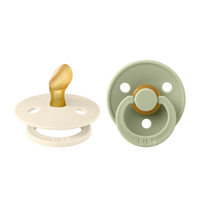 set-2-suzete-cu-tetina-anatomica-colour-latex-0-luni-ivory-sage-bibs-8438.png