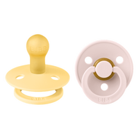 set-2-suzete-cu-tetina-rotunda-pale-butter-petal-0-luni-bibs-4243.png