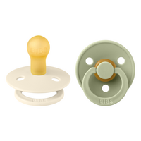 set-2-suzete-cu-tetina-rotunda-colour-latex-0-luni-ivory-sage-bibs-9476.png