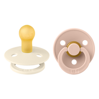 set-2-suzete-cu-tetina-rotunda-colour-latex-0-luni-ivory-blush-bibs-9629.png