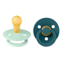 set-2-suzete-cu-tetina-rotunda-colour-latex-0-luni-nordic-mint-forest-lake-bibs-6495.png