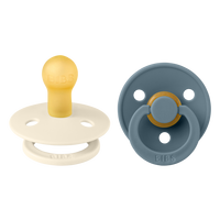 set-2-suzete-cu-tetina-rotunda-colour-latex-6-luni-ivory-petrol-bibs-7043.png
