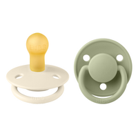 set-2-suzete-cu-tetina-rotunda-din-latex-de-lux-0-luni-ivory-sage-bibs-2017.png