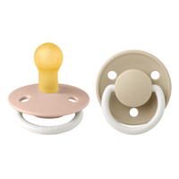 set-2-suzete-fosforescente-cu-tetina-rotunda-universala-din-latex-de-lux-glow-0-luni-blush-vanilla-bibs-2270.png